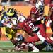 Michigan senior quarterback Denard Robinson attempts to move the ball past South Carolina's Brison Williams in the second half of the Outback Bowl at Raymond James Stadium in Tampa, Fla. on Tuesday, Jan. 1. Melanie Maxwell I AnnArbor.com